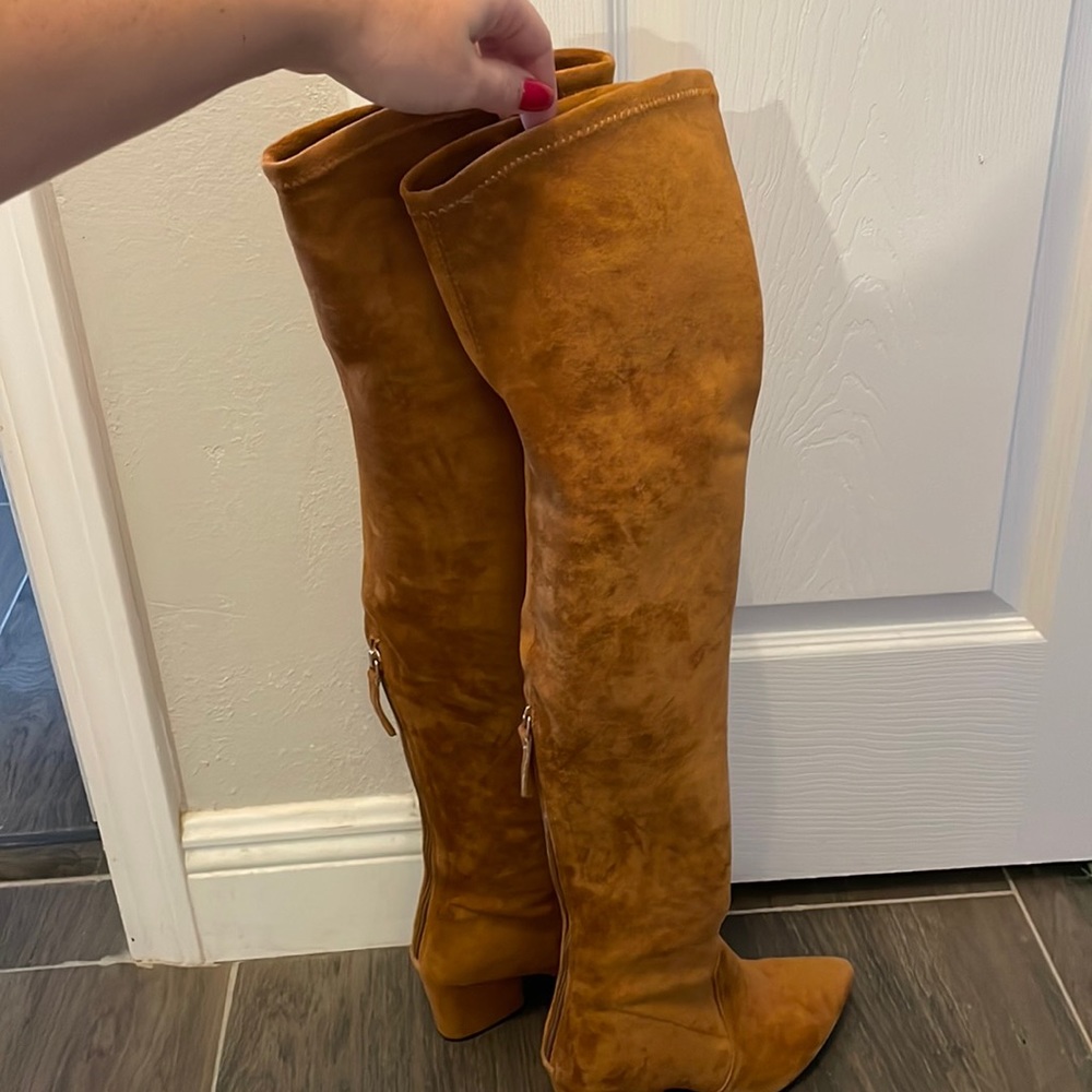 Thigh high heeled boots